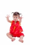 Little Asian Girl (thai) In Traditional Chinese Cheongsam Stock Photo