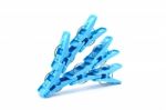 Blue Clothes Pegs Stock Photo