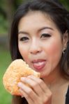Girl Eating A Cheeseburger Stock Photo