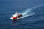 Supply Boat Transfer Cargo To Oil And Gas Industry Stock Photo