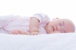 Newborn Baby Girl Sleeping In Bed Stock Photo