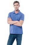 Smart Young Man With Crossed Arms Stock Photo