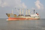 Old Industrial Product Ship Float On Wide River Stock Photo