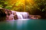 Thailand Waterfall With Sunbeam In Kanjanaburi (erawan Waterfall Stock Photo