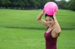Asian Girl And Pink Ball Stock Photo
