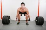 Young And Muscular Guy Holding A Barbell.  Crossfit Dead Lift Ex Stock Photo