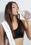 Young Girl Drinking Water Stock Photo