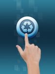 Hand Pressing Recycle Button Stock Photo