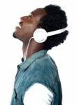 A Handsome Young Boy With Headphones Stock Photo