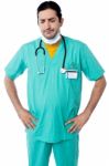 Experienced Surgeon With Hands On His Waist Stock Photo
