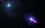 Star With Abstract Lens Flare Stock Photo