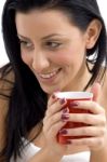 Close Up Of Smiling Female Holding Coffee Mug Stock Photo