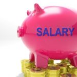 Salary Piggy Bank Means Payroll And Earnings Stock Photo