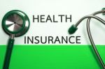 Medical Insurance Document In Green Folder Stock Photo