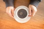 Hands Holding Cup Of Hot Coffee Stock Photo