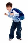 Adorable Young Kid Holding His School Bag Stock Photo