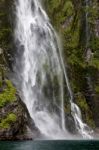 Waterfall At Milford Sound Stock Photo