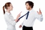 Businesswoman Scolding Her Colleague Stock Photo