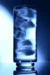 Glass Of Water Spot Light Blue With Ice Stock Photo