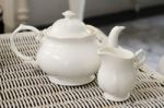 Teapot With Little Milk Jar Stock Photo