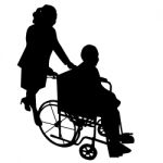 Silhouettes Of Woman In Wheelchair Stock Photo