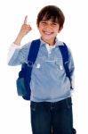 Cute Young Boy Pointing Upwards Stock Photo