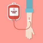 Hand Donor With Blood Donation Bag Stock Photo