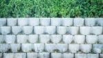 Grey Brick Block Wall In The Garden Stock Photo