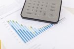 Business Analysis - Accounting Report With Calculator Stock Photo