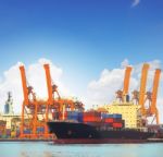 Commercial Ship And Cargo Container On Port Use For Import Expor Stock Photo