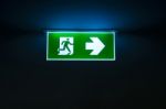 Green Emergency Exit Sign The Way To Escape Stock Photo