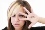 Woman Showing Hate Text Stock Photo