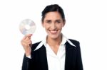 Business Woman Holding Compact Disc Stock Photo