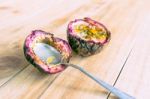 Ripe Passion Fruit On A Wooden Background Stock Photo