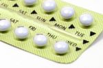 Gold Strip Of Contraceptive Pill With English Instructions Closed-up On White Background Stock Photo