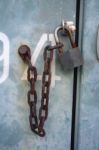 Check-lock And Chain On Iron Cabinet Stock Photo