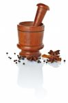 Wooden Mortar And Pestle With Spices Ready For Grinding Stock Photo