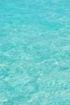 Blue And Translucid Ocean Water From Maldives Stock Photo