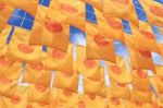 Buddha Rectangle Flag Lines Under Blue Sky Stock Photo