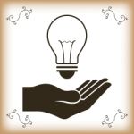 Abstract Creative Idea Holding Hand  With Light Bulb Background Stock Photo