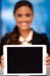 Corporate Lady Showing Tablet Device Stock Photo