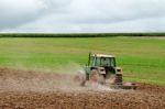 Tractor Ploughing Field Stock Photo