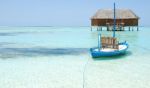 Honeymoon Villa In Maldives And Typical Boat Stock Photo
