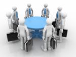 3d Businessmen Standing  At A Round Table And Having Business Me Stock Photo