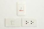 Three Type Switch On White Wall Stock Photo