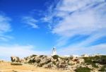 White Mediterranean Lighthouse Stock Photo