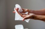 Cleaning Hands And Fingers With Wet Wipes Stock Photo
