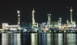 Oil Refinery Plant Night Scene Nearby River Stock Photo