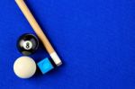 Billiard Balls, Cue And Chalk In A Blue Pool Table Stock Photo