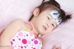 Close Up Sick Little Asian Girl With Mercury Thermometer Stock Photo